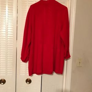 Red sweater with sequined beading